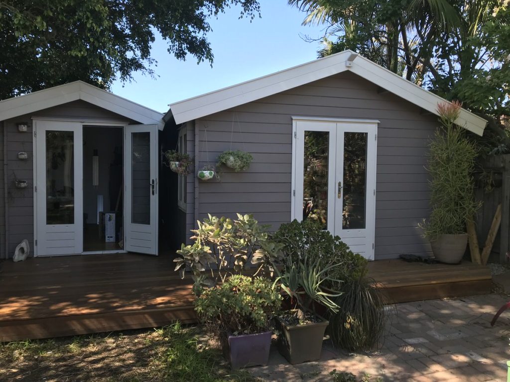 Tasman Cabin guest house sleepout in a metro backyard