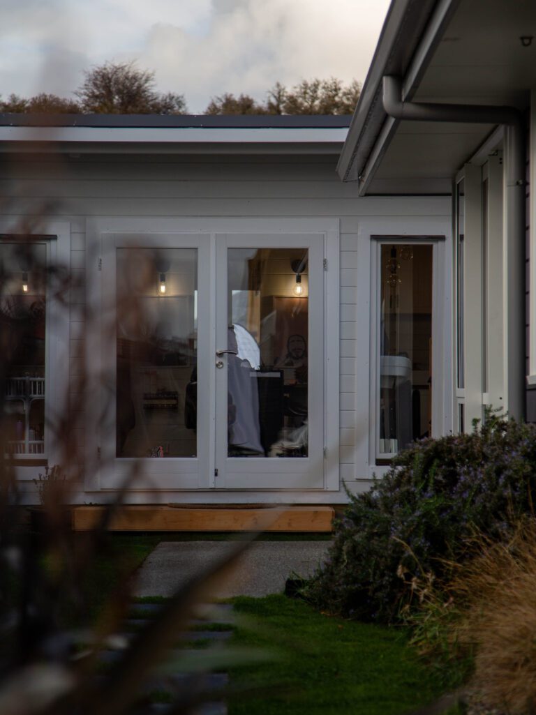 Coastal kitset cabin as a home-based hair salon