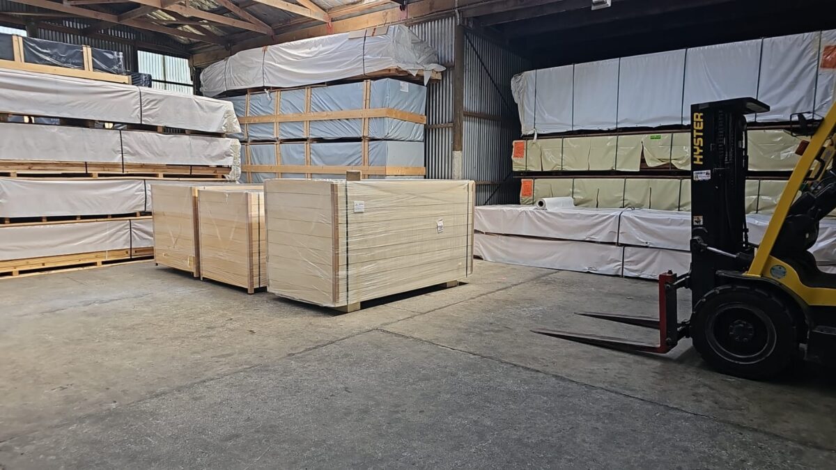 Kitset cabins stored in the SheShed NZ warehouse